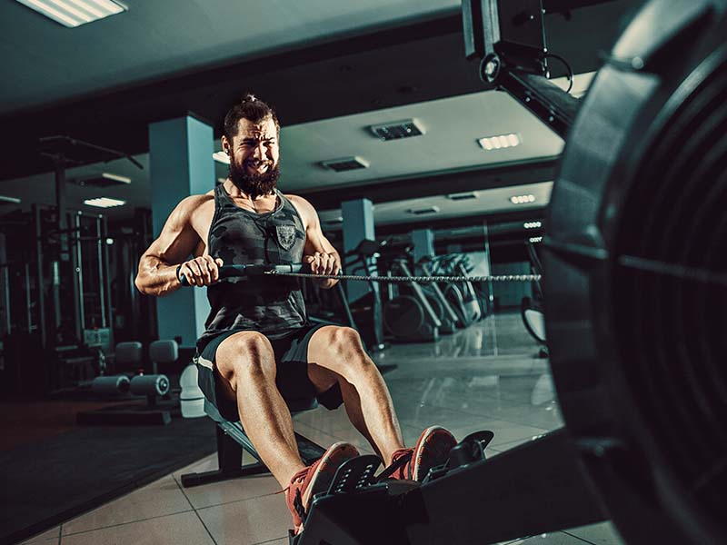 Gym Machines Vs Free Weights: The Ultimate Showdown - Caliber Fitness